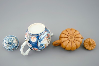 A Chinese famille rose teapot, 18th C. and a Yixing teapot, 19/20th C.